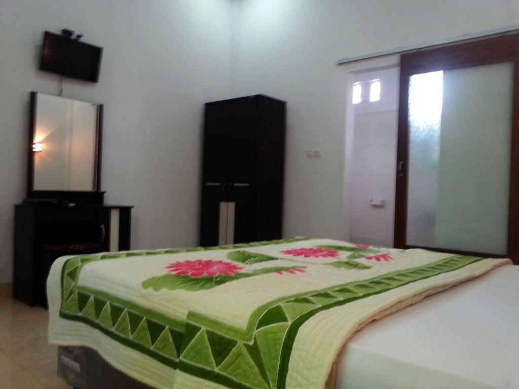 Krisna Homestay Kuta  Δωμάτιο φωτογραφία