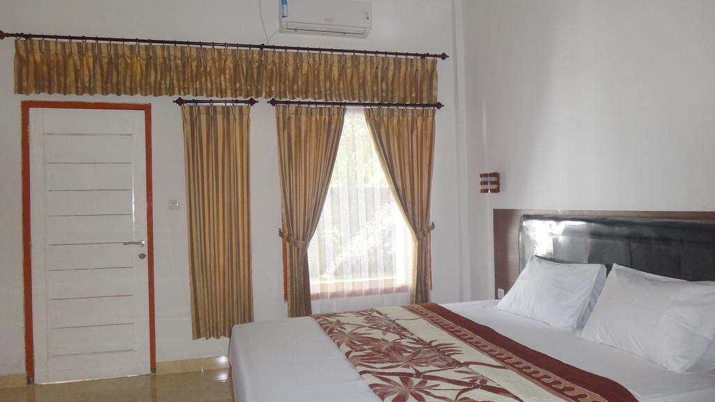 Krisna Homestay Kuta  Δωμάτιο φωτογραφία